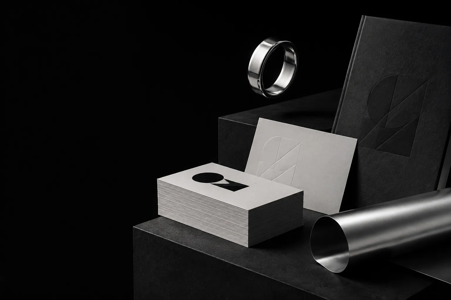 Black and silver brand identity composition